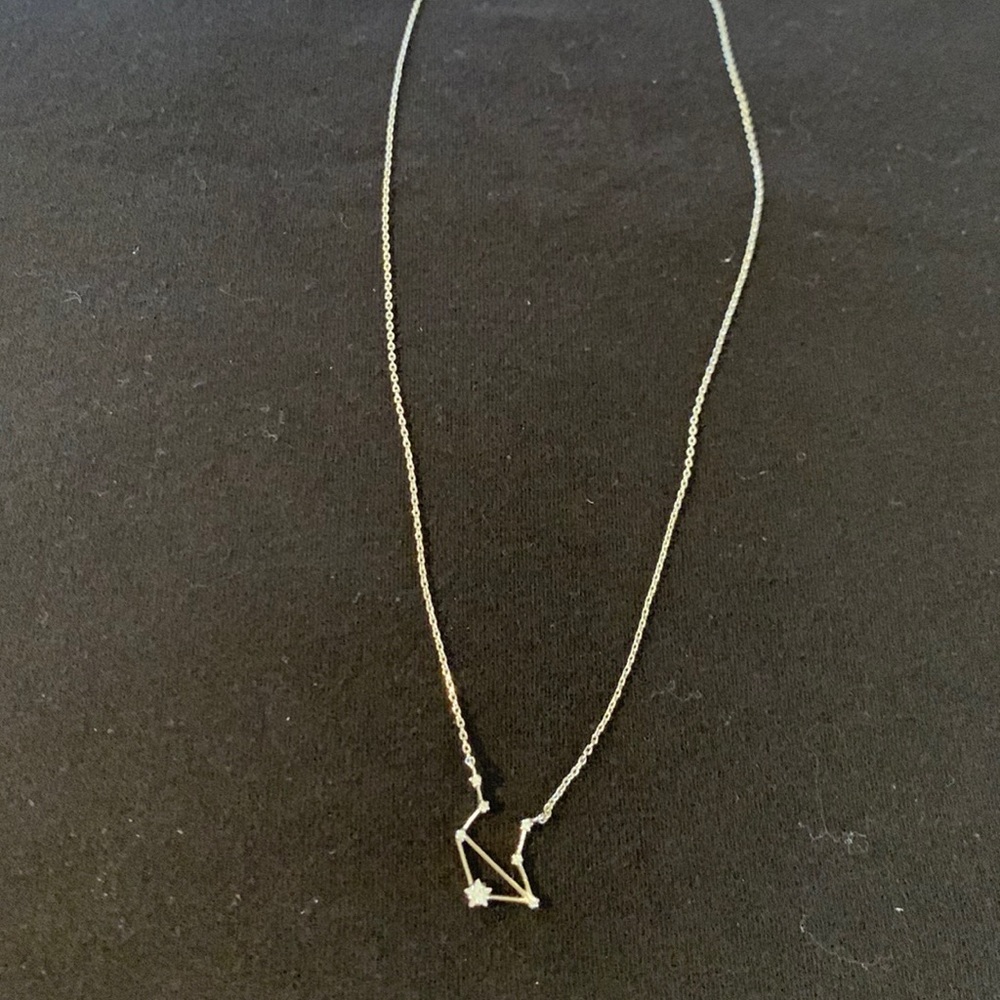 Libra CZ star silver tone necklace.‎